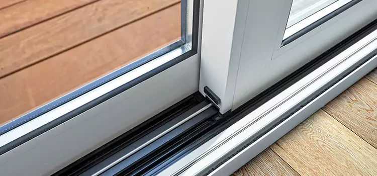 Why Your Sliding Door Keeps Getting Stuck in East Lansing, MI?